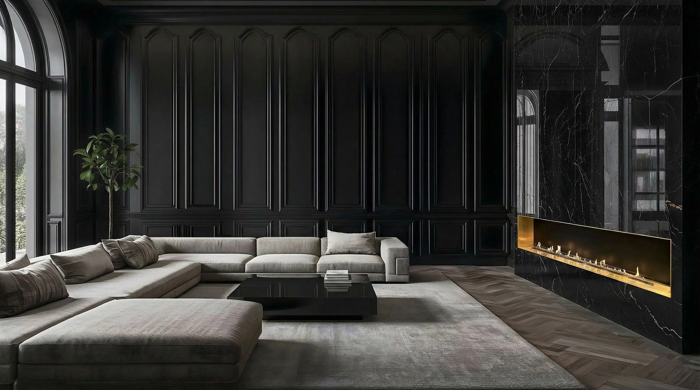 A long built-in bioethanol fireplace in a dark stone wall of a living room