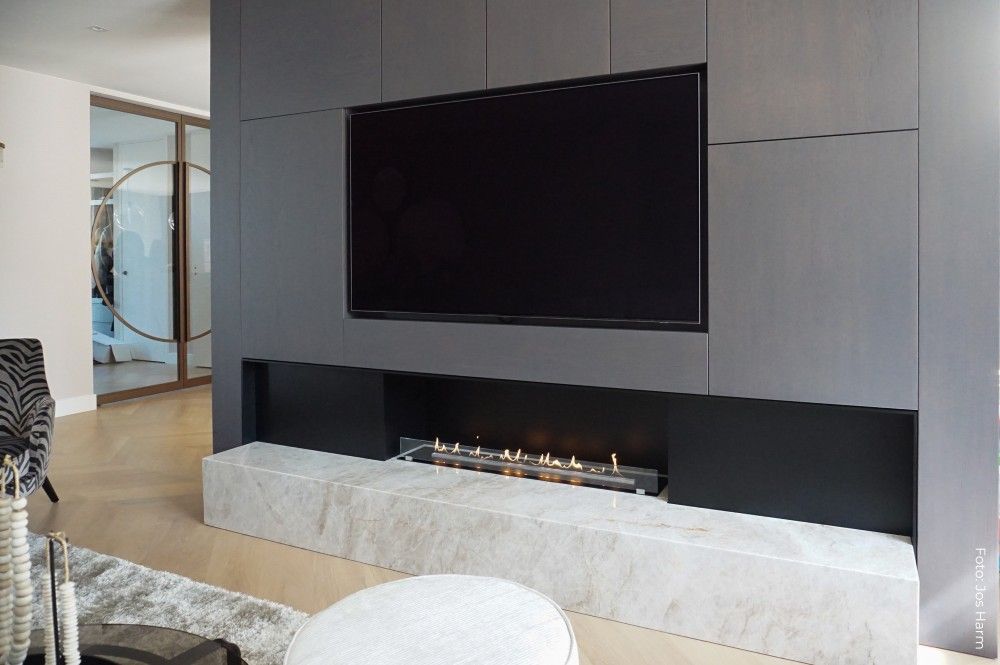 Long burner below a media wall